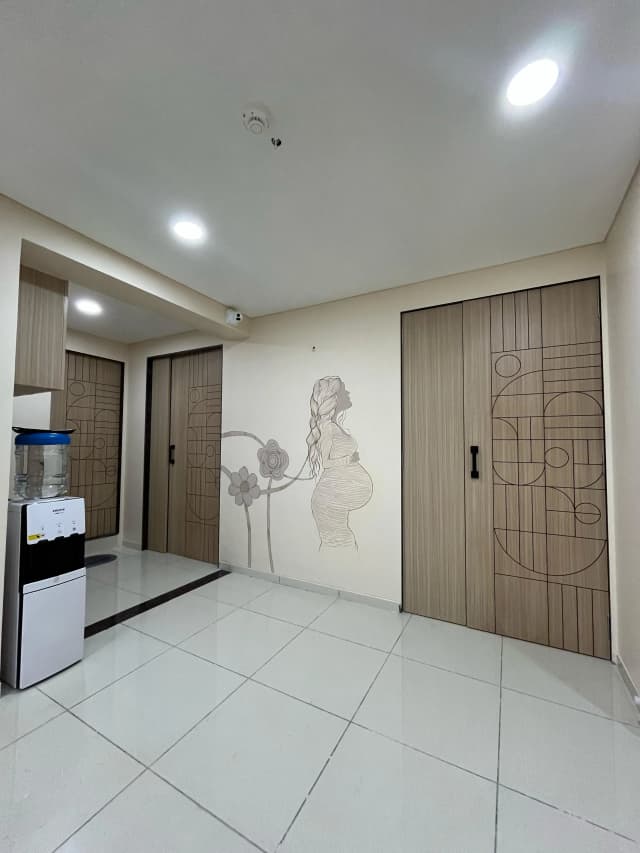 Corridor with Wall Art and Water Dispenser